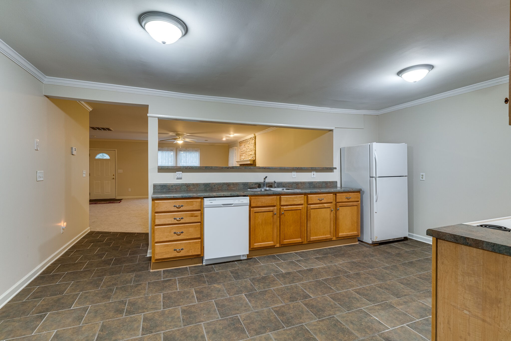 808 Nesbitt Lane Madison, TN 37115 - Photo 15 of 38 a view of kitchen with stainless steel appliances granite countertop cabinets and window