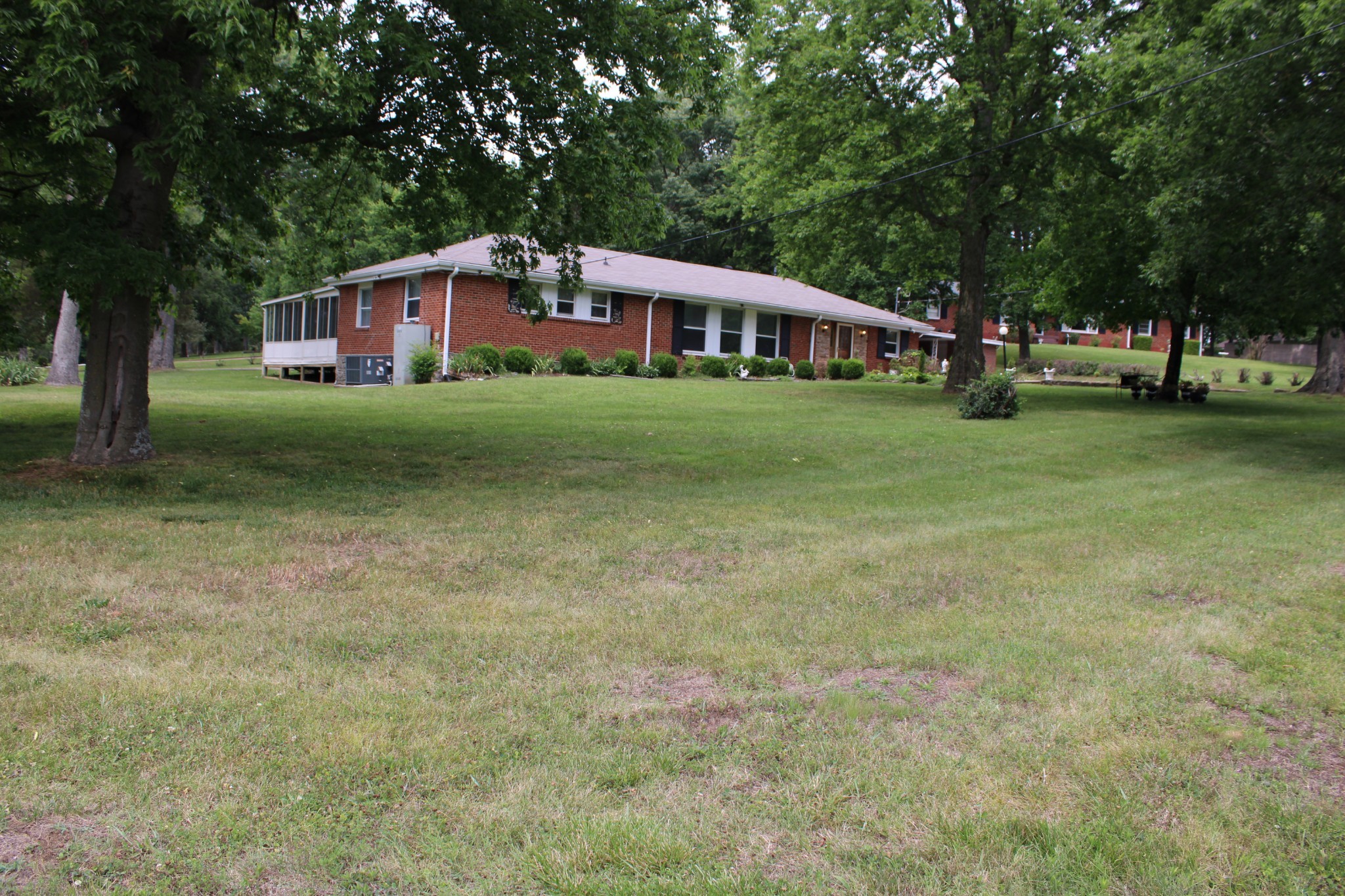 808 Nesbitt Lane Madison, TN 37115 - Photo 2 of 38 a front view of house with yard and green space