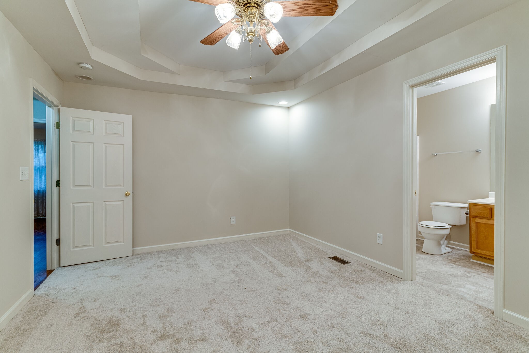 808 Nesbitt Lane Madison, TN 37115 - Photo 27 of 38 wooden floor in an empty room with a bathroom