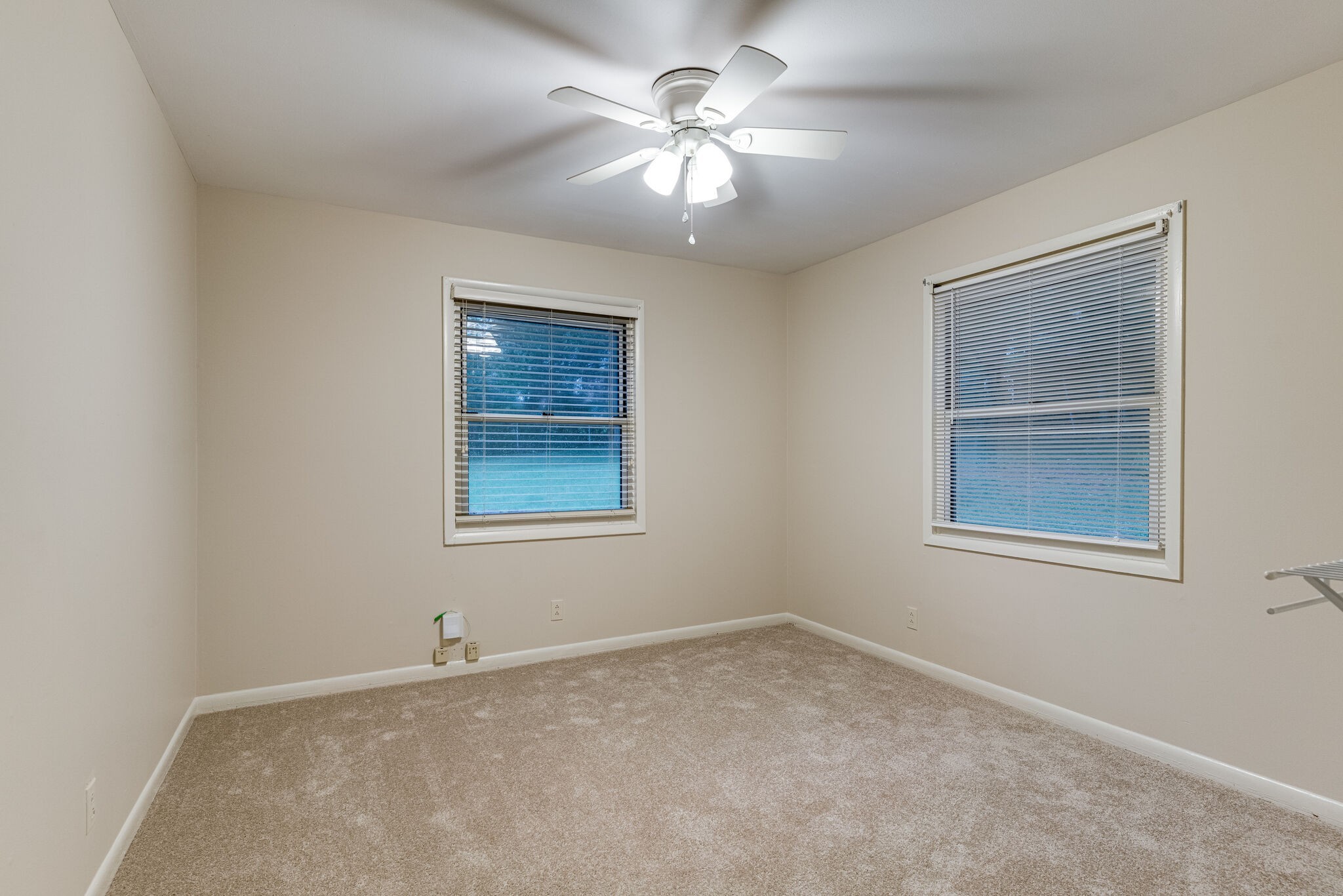 808 Nesbitt Lane Madison, TN 37115 - Photo 30 of 38 an empty room with a window and a ceiling fan