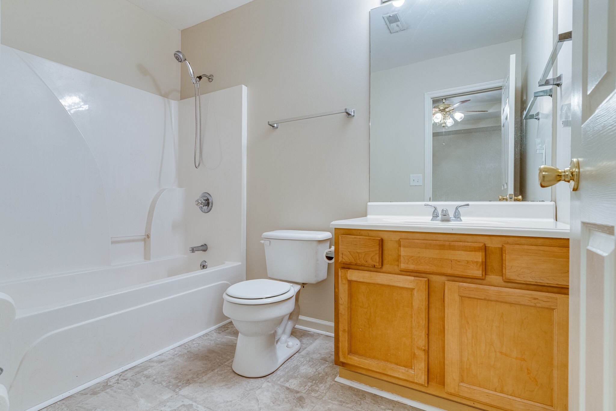 808 Nesbitt Lane Madison, TN 37115 - Photo 37 of 38 a bathroom with a granite countertop toilet sink and mirror