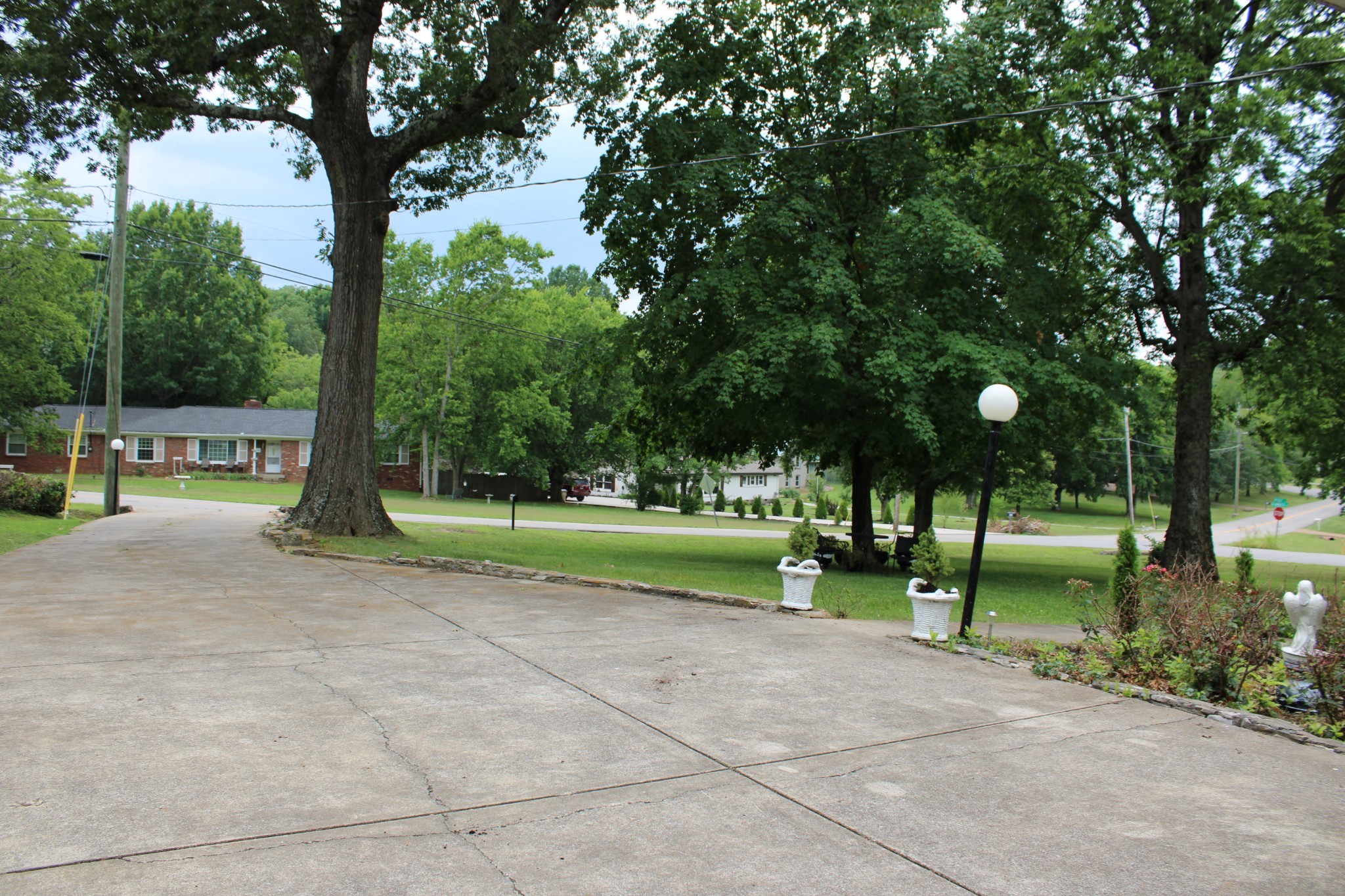 808 Nesbitt Lane Madison, TN 37115 - Photo 4 of 38 a view of a park with large trees