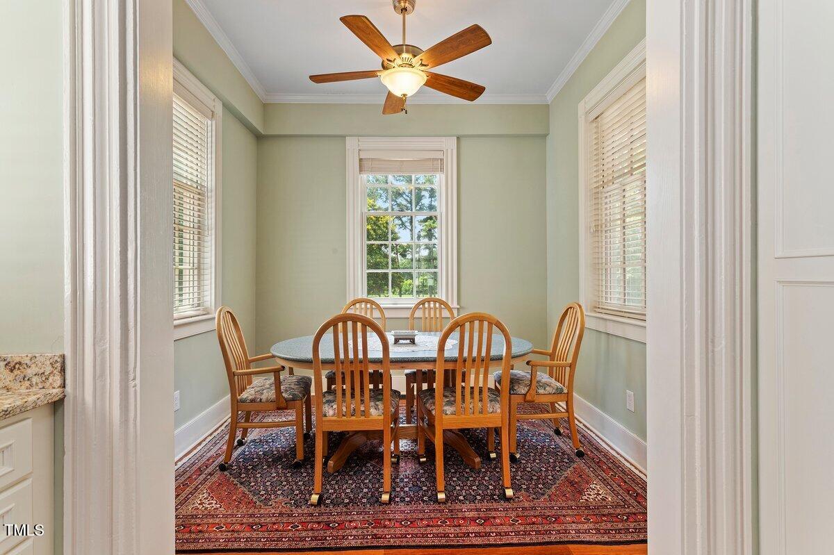 206 Shaver Road Macon, NC 27551 - Photo 27 of 68 a view of a dining room with furniture window and wooden floor