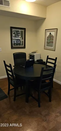 a view of a workspace with furniture