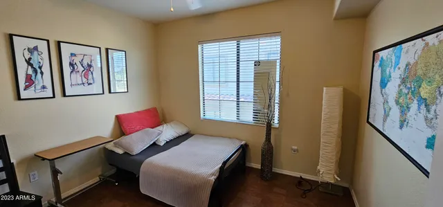 a workspace with furniture and window