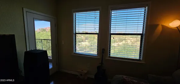 a view of a room that has a window in it