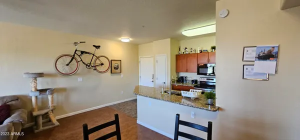 a room with a table and chairs