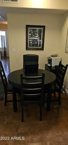 a view of a workspace with furniture