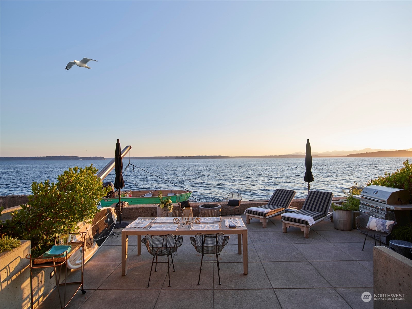 a view of a terrace with furniture and stove
