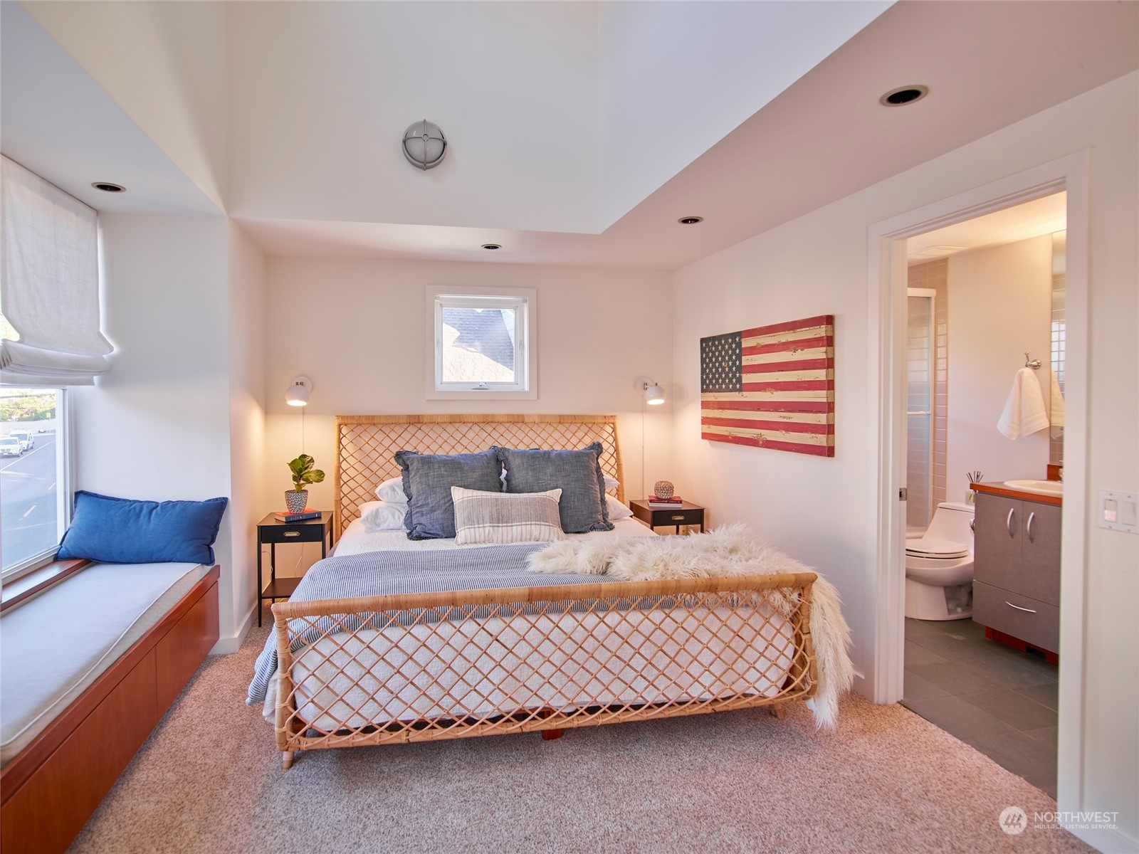 4141 Beach Drive Southwest Seattle, WA 98116 - Photo 19 of 31 a bedroom with a bed and a couch