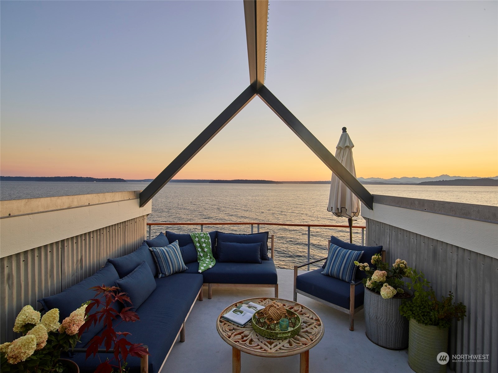 4141 Beach Drive Southwest Seattle, WA 98116 - Photo 22 of 31 a roof deck with couch and potted plants