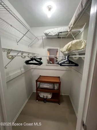 a bathroom with a bathtub shower sink mirror and toilet