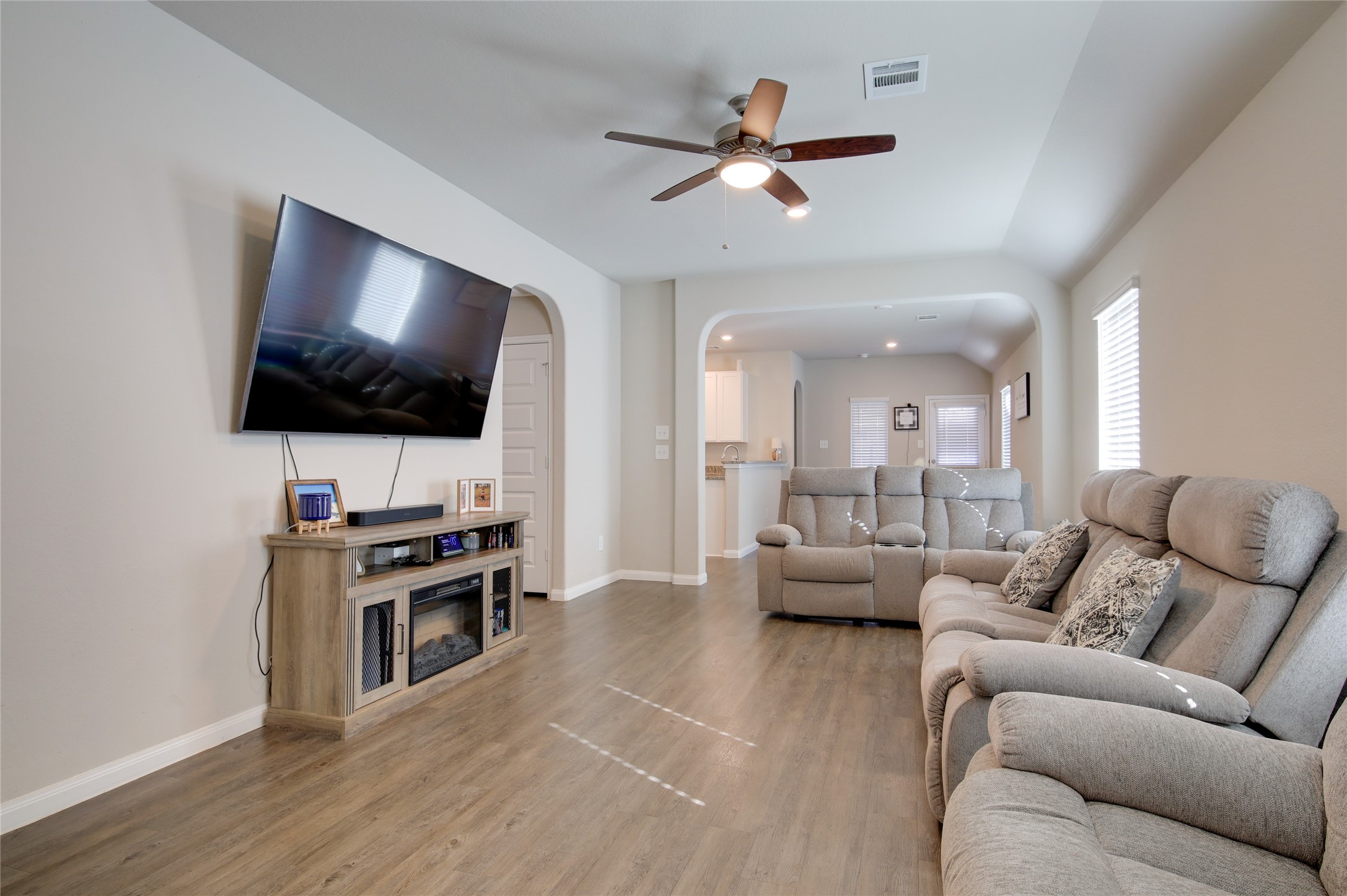 14026 Chinook Drive Conroe, TX 77384 - Photo 8 of 34 a living room with furniture and a flat screen tv
