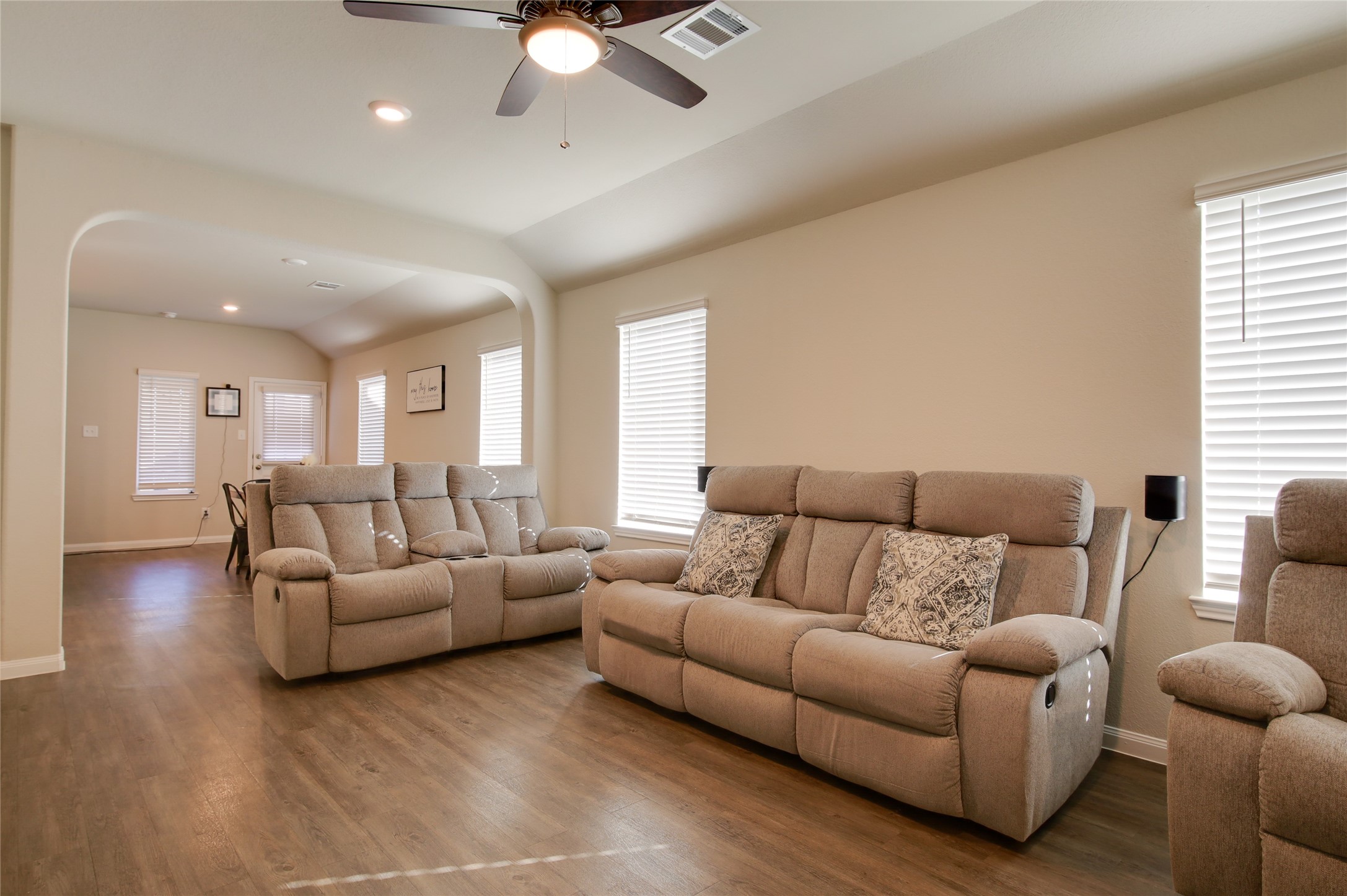 14026 Chinook Drive Conroe, TX 77384 - Photo 9 of 34 a living room with furniture and a large window
