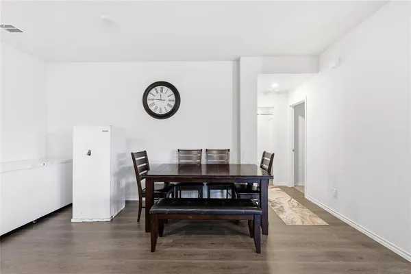 a view of a table and chairs