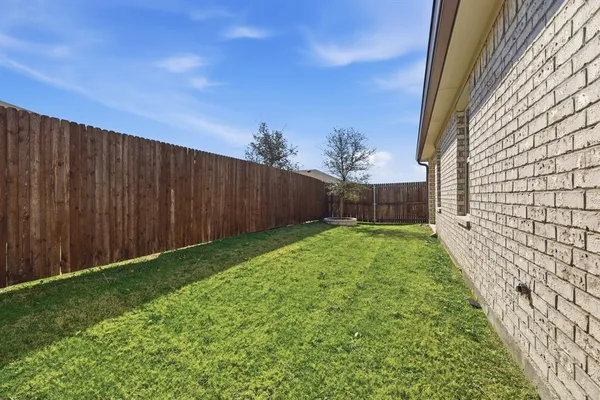 a view of yard with entertaining space