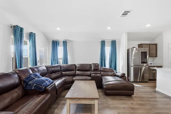 a living room with furniture and a couch