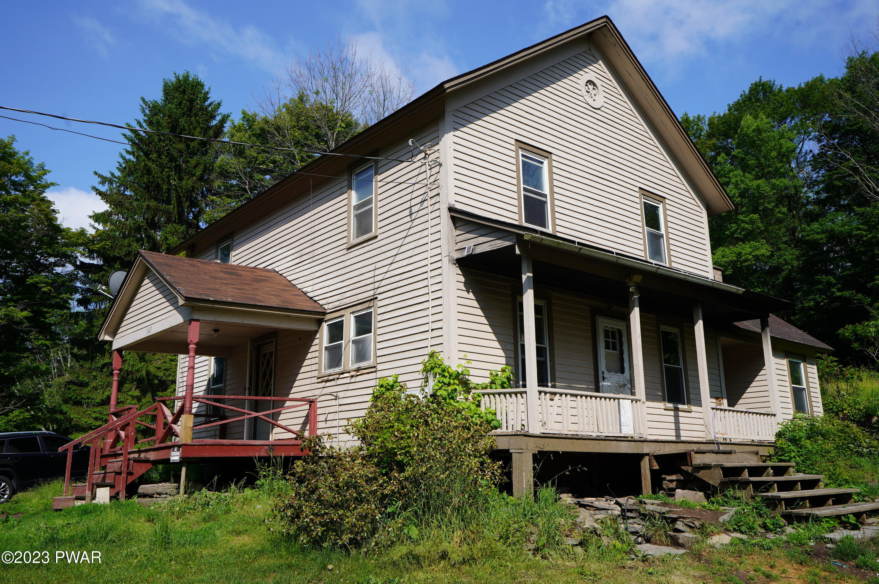 147 Daniels Road Lake Ariel, PA 18436 - Photo 3 of 25 a view of house with a yard and furniture
