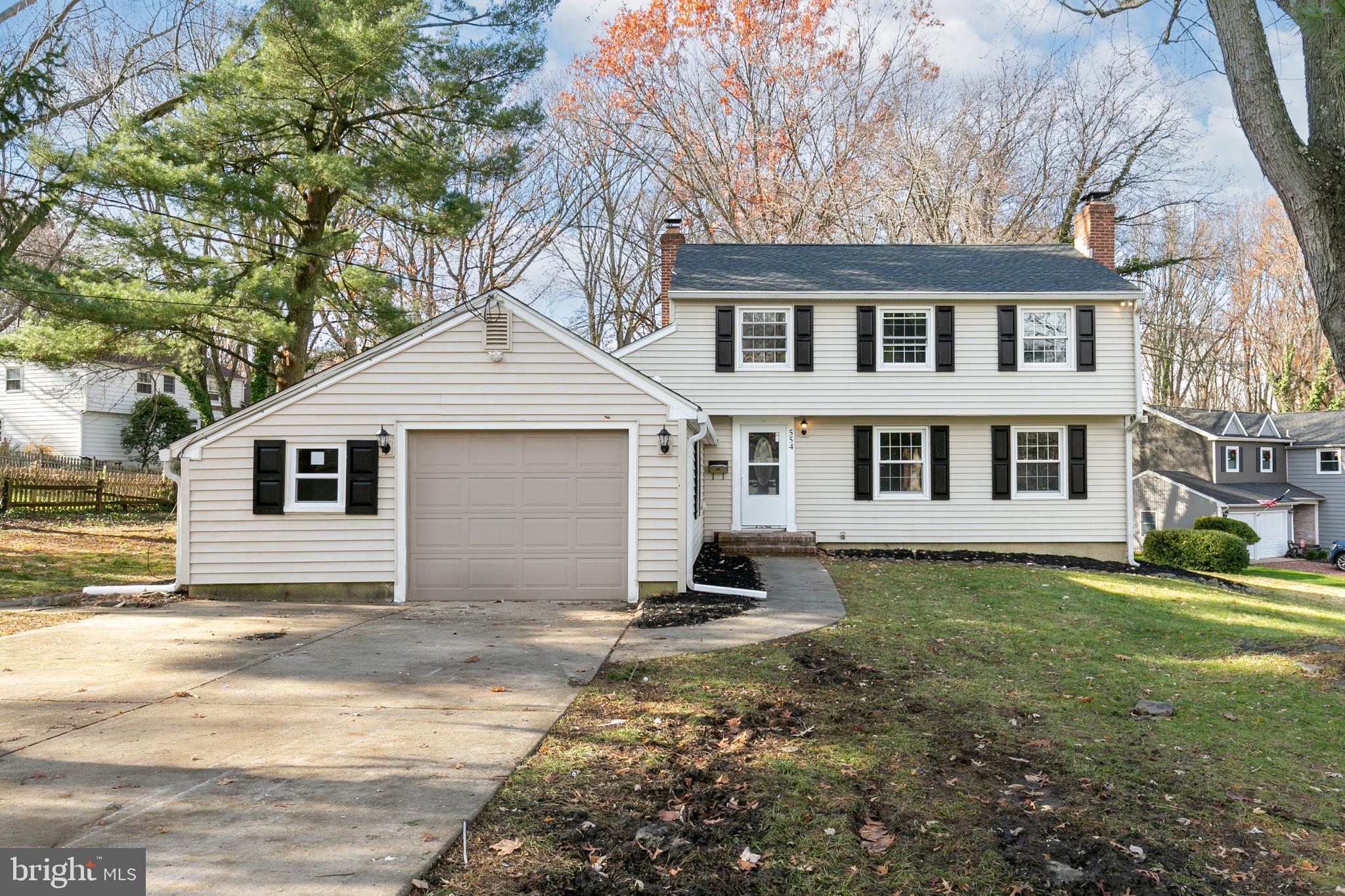 554 Covered Bridge Road Cherry Hill, NJ 08034 - Photo 1 of 29 a view of a yard in front of a house with plants