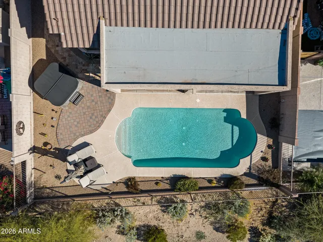 an aerial view of a fireplace with wooden fence