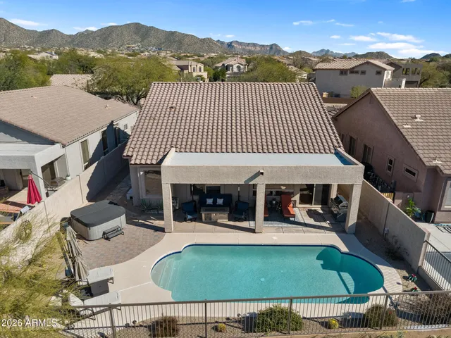an outdoor space with furniture and mountain view