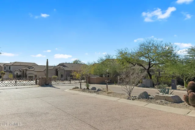 a view of a road with a building in the background
