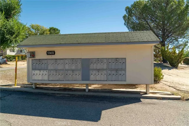 a front view of a house with a garage