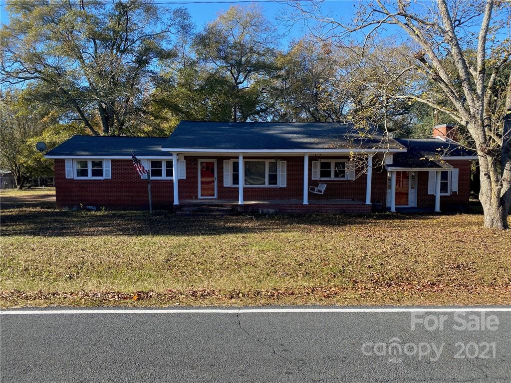 71 Mclendon Road Morven, NC 28119 - Photo 1 of 21 front view of a house with a yard