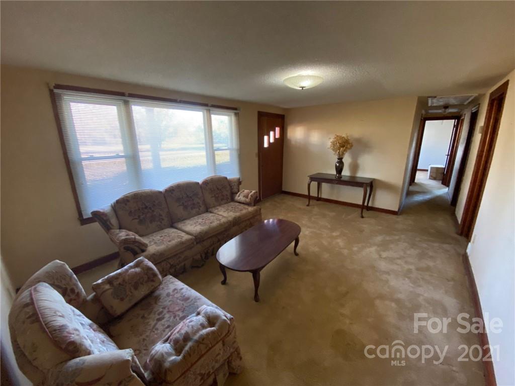 71 Mclendon Road Morven, NC 28119 - Photo 19 of 21 a living room with furniture and a window