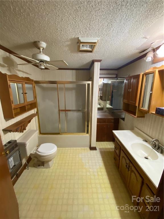 71 Mclendon Road Morven, NC 28119 - Photo 21 of 21 a bathroom with a sink a toilet and shower