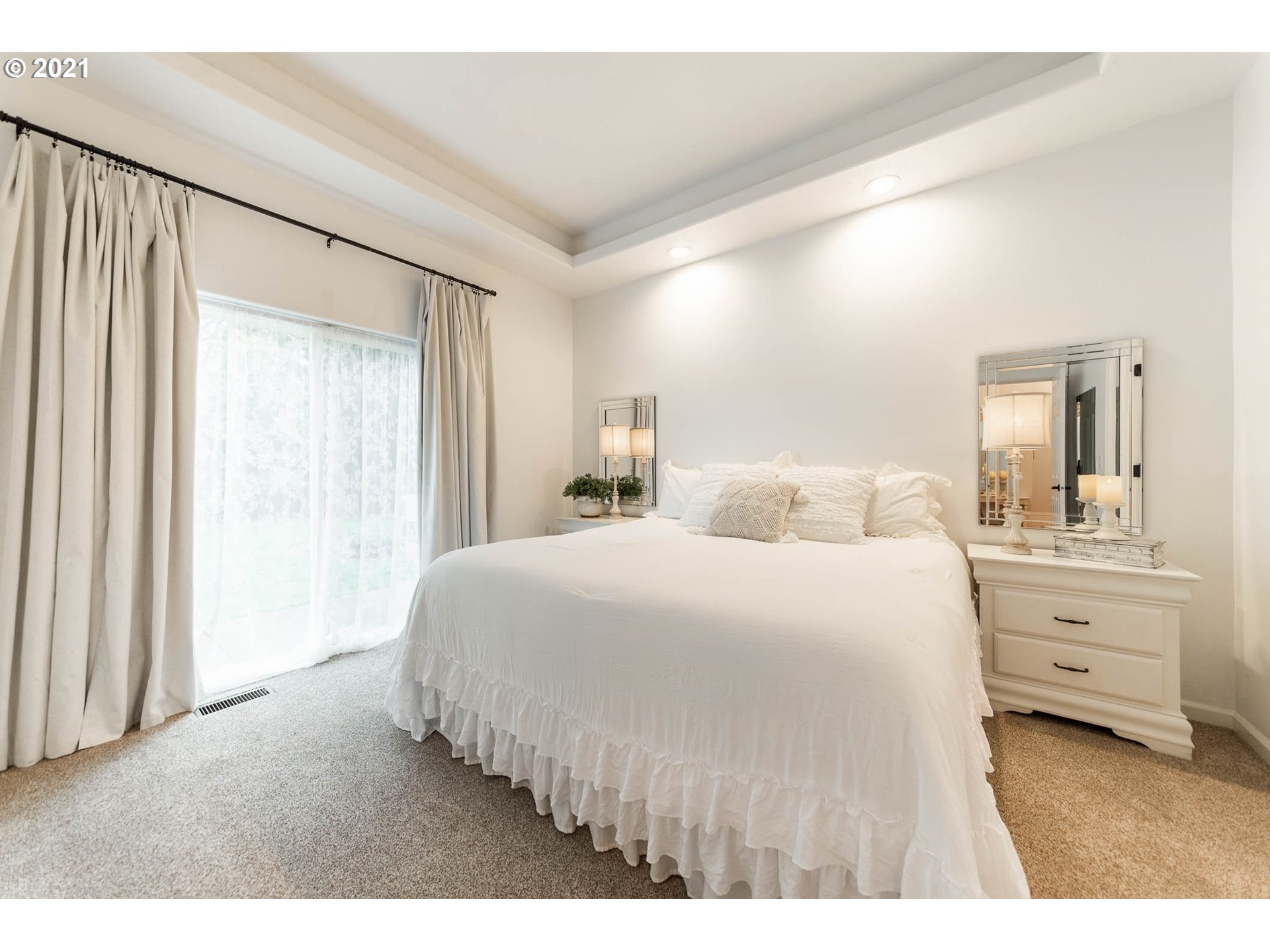 678 63rd Street Springfield, OR 97478 - Photo 14 of 32 a bedroom with a bed and a large mirror