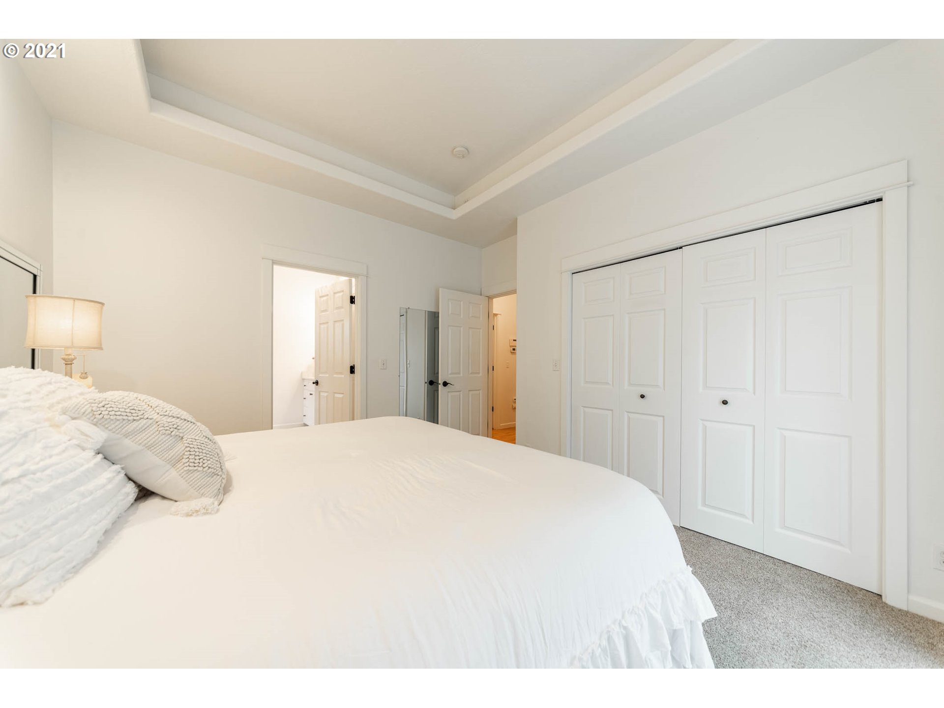 678 63rd Street Springfield, OR 97478 - Photo 15 of 32 a large white bed in a white room