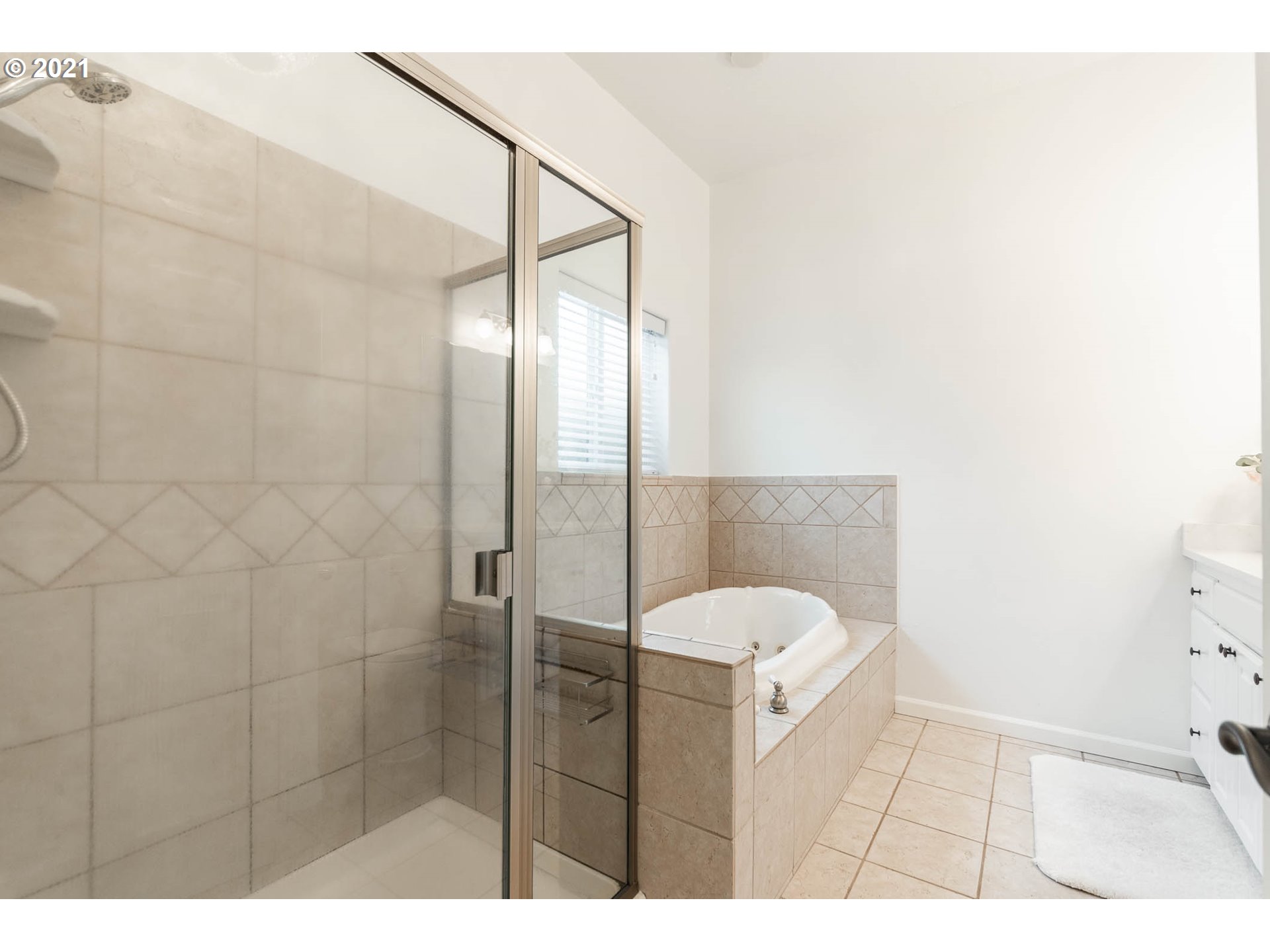 678 63rd Street Springfield, OR 97478 - Photo 16 of 32 a bathroom with a bathtub and shower