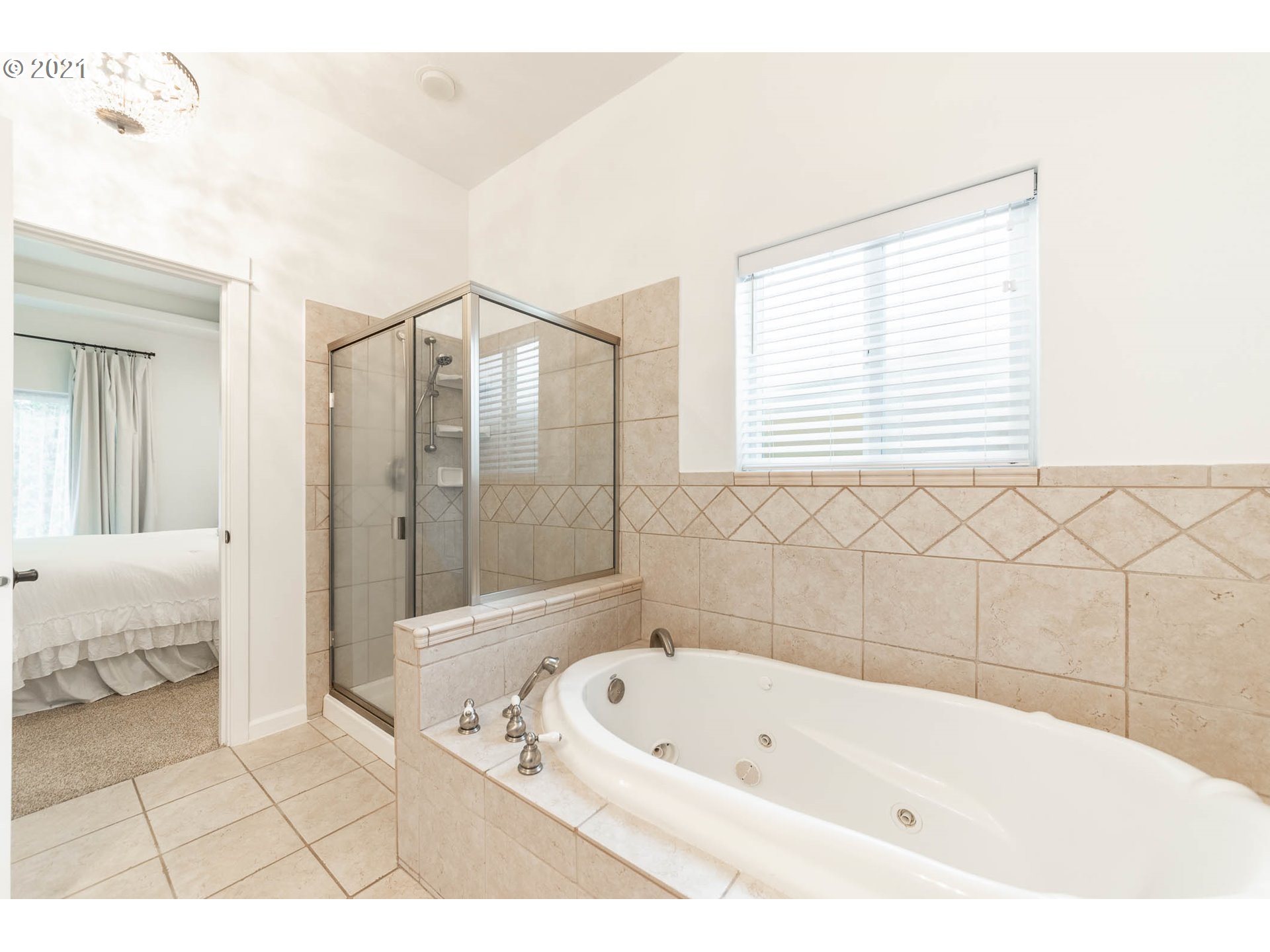 678 63rd Street Springfield, OR 97478 - Photo 17 of 32 a bathroom with a bathtub and a shower