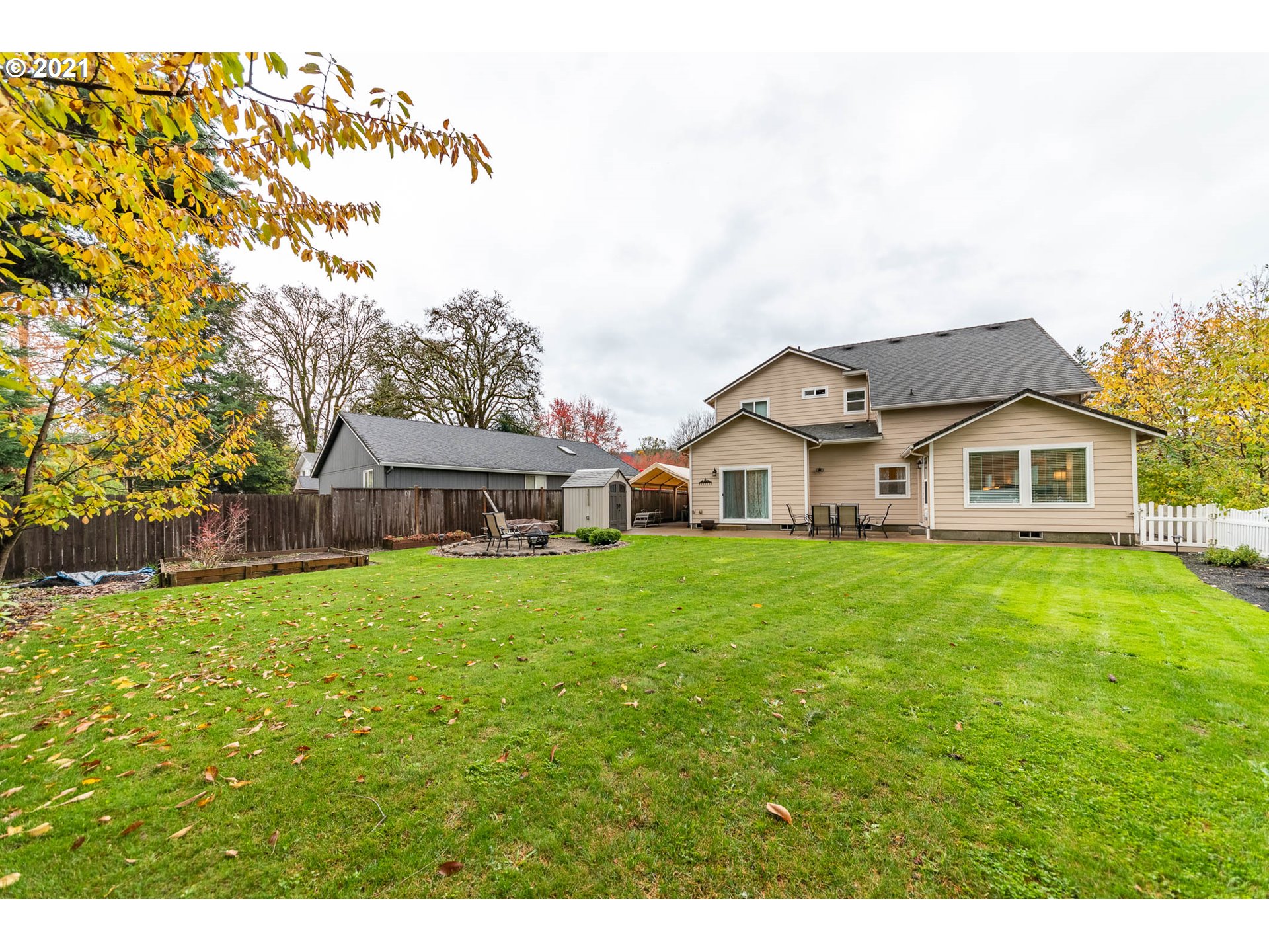 678 63rd Street Springfield, OR 97478 - Photo 27 of 32 a front view of a house with a garden