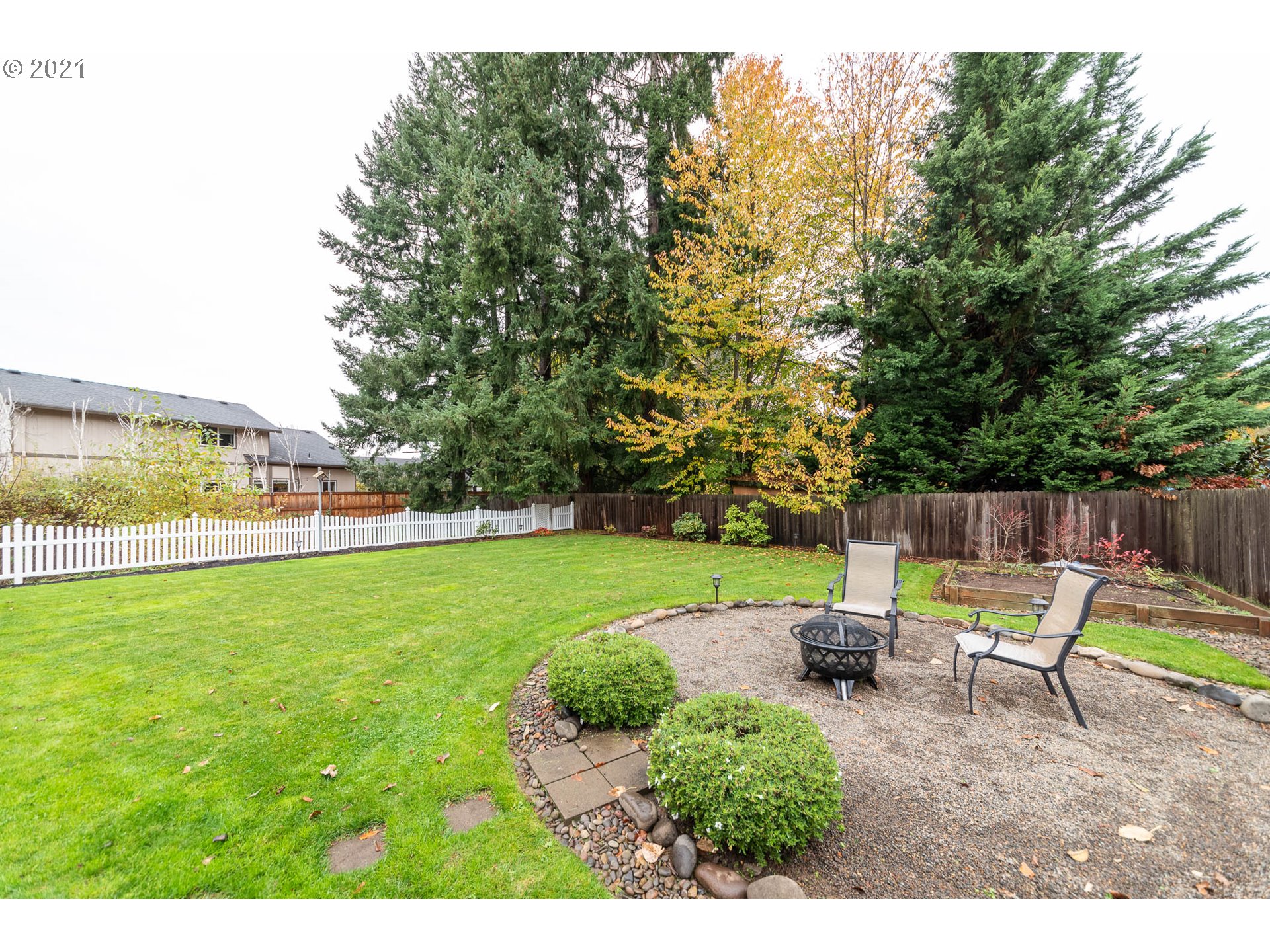 678 63rd Street Springfield, OR 97478 - Photo 29 of 32 a garden view with a seating space