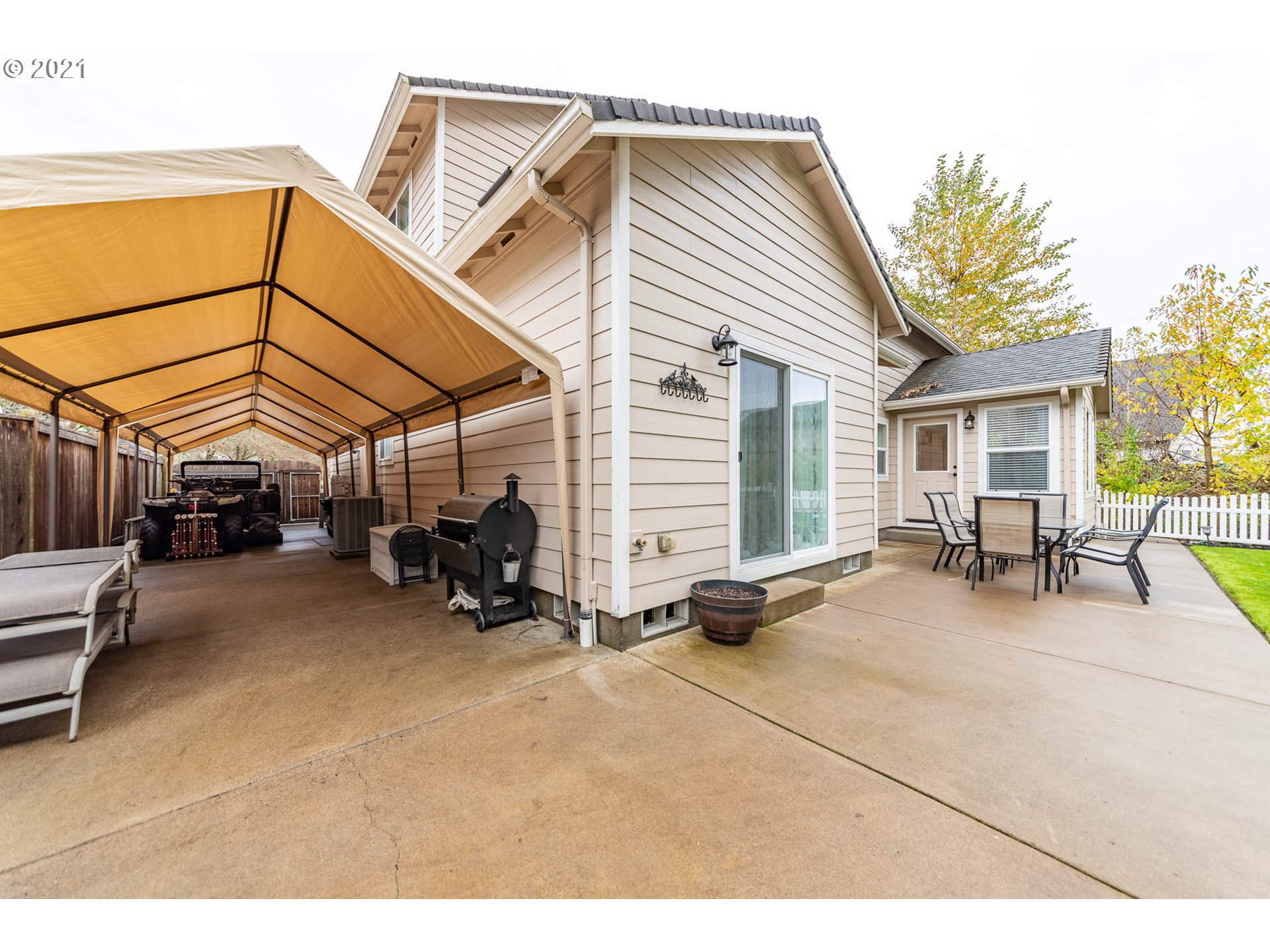 678 63rd Street Springfield, OR 97478 - Photo 30 of 32 a view of a house with a patio