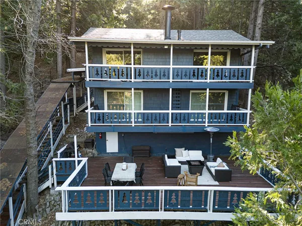 a front view of residential building with front door and windows