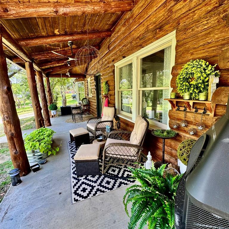 104 Advance Road Weatherford, TX 76088 - Photo 16 of 38 a outdoor living space with furniture and garden