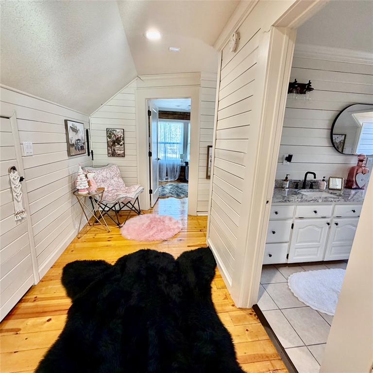 104 Advance Road Weatherford, TX 76088 - Photo 18 of 38 a bed room with a bed and a cabinets