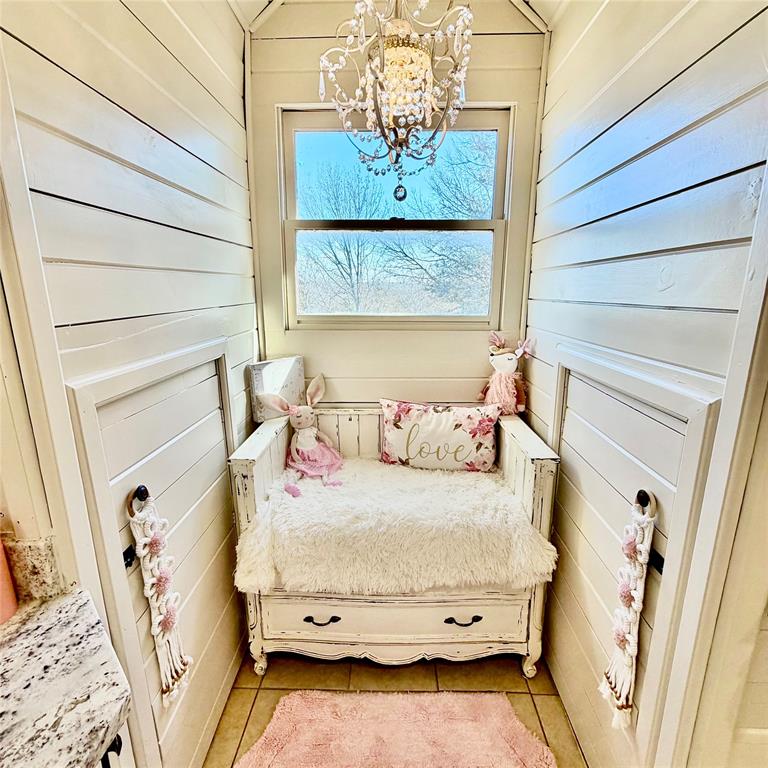 104 Advance Road Weatherford, TX 76088 - Photo 21 of 38 a bedroom with a bed and a window