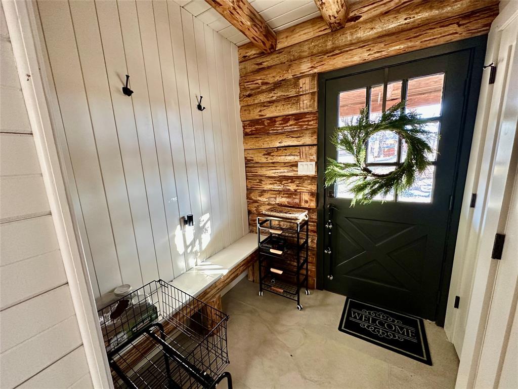 104 Advance Road Weatherford, TX 76088 - Photo 6 of 38 a room with water heater and a window