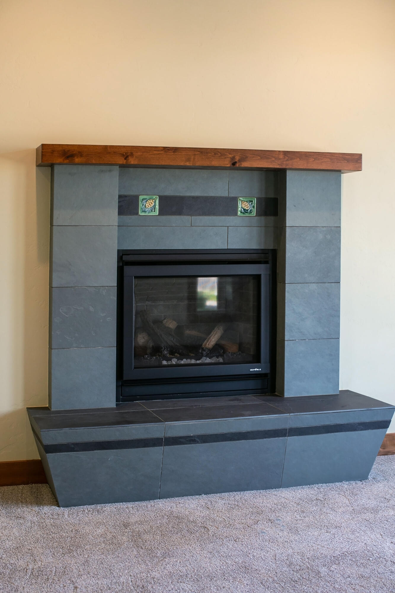 1472 Northeast Hudspeth Road Prineville, OR 97754 - Photo 7 of 26 a fireplace with a hallway