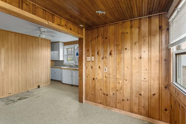 a bathroom with a toilet a sink and shower