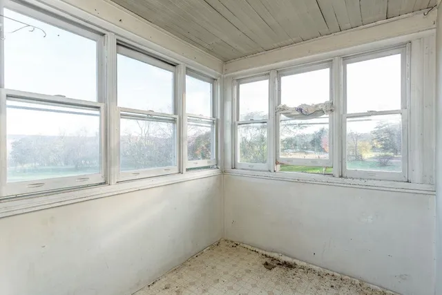 an empty room with windows