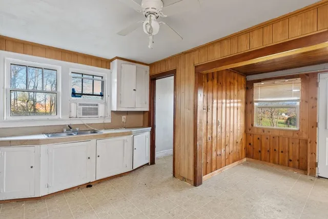 a view of a kitchen with an entryway