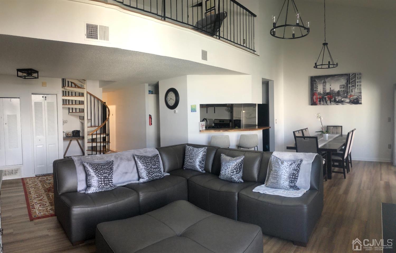 233 Edpas Road New Brunswick, NJ 08901 - Photo 5 of 18 a living room with furniture and a flat screen tv