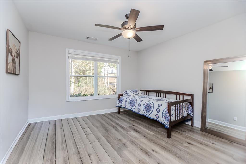 43 Water Lily Way Pendergrass, GA 30567 - Photo 17 of 71 a bedroom with a bed and window