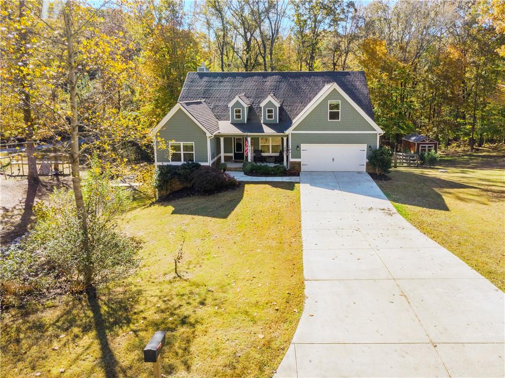 43 Water Lily Way Pendergrass, GA 30567 - Photo 2 of 71 a front view of house with yard