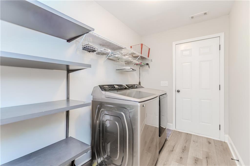 43 Water Lily Way Pendergrass, GA 30567 - Photo 28 of 71 a utility room with dryer and washer
